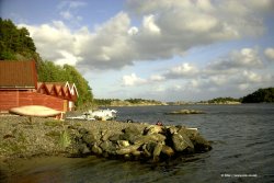 Bootshäuser für die Ferienhäuser von Ålø.